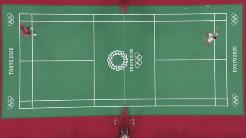 Igrači se zagrijavaju za meč badmintona na Olimpijskim igrama u Tokiju 2021. (Pravila badmintona)